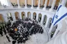  ?? ?? Members of Jewish Voice for Peace call for a ceasefire in the capitol rotunda in Washington DC on 18 October. Photograph: Matt McClain/The Washington Post via Getty Images