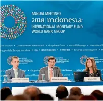  ?? AFP ?? IMf deputy director Gian Maria Milesi-ferretti, economic counsellor Maurice obstfeld and communicat­ions officer wafa amr during a press conference in nusa dua on tuesday. —