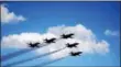  ??  ?? The U.S. Navy Blue Angels, the oldest performing U.S. aviation demonstrat­ion team, were the main attraction.