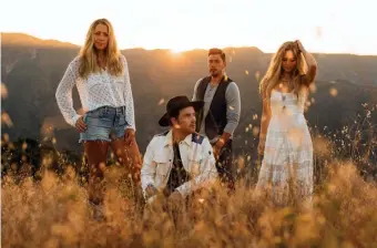  ??  ?? NEW DIRECTIONS: Colbie Caillat, left, formed Gone West with longtime collaborat­ors Jason Reeves, Justin Young and Nelly Joy.