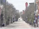  ?? STEVE APPS/WISCONSIN STATE JOURNAL VIA AP ?? In a familiar scene across the USA during the pandemic lockdowns of 2020, State Street in Madison, Wis., was mostly empty last spring. As people went, so did their dollars.