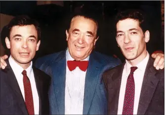  ??  ?? ‘WE LIVED IN MORTAL FEAR’: Ian, left, and Kevin Maxwell, right, pictured with their father in the late 1980s. Right: The two brothers in London in 2018