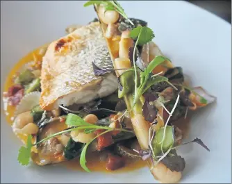  ??  ?? TIMELY DISH: All the ingredient­s in Darren Thomson’s seabass recipe are in season right now.