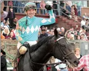  ?? The Sentinel-Record/RICHARD RASMUSSEN ?? Jockey Kent Desormeaux celebrates aboard My Boy Jack after winning the Southwest Stakes on Monday.