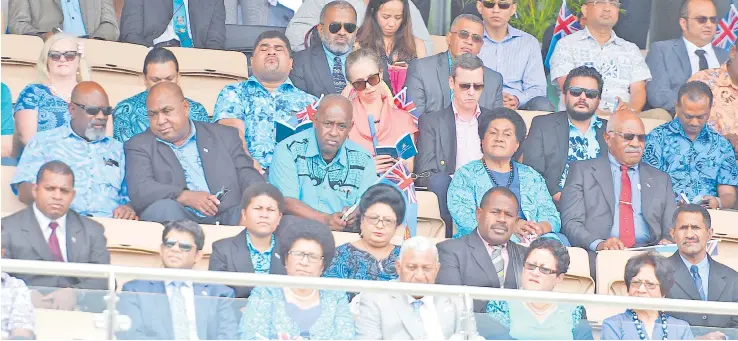  ?? Photo: Ronald Kumar ?? SODELPA leader Sitiveni Rabuka (right, third row from bottom) and wife, Sulueti, joined Prime Minister Voreqe Bainimaram­a (bottom row, middle), Attorney-General and Minister for Economy Aiyaz Sayed-Khaiyum (bottom row, left), with other key Government Members of Parliament and invited guests during the Constituti­on Day celebratio­ns at Albert Park yesterday. He was the only Opposition party leader to join in the celebratio­ns.