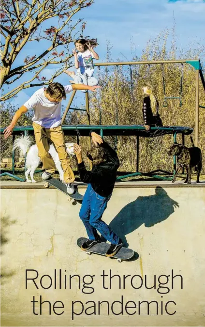  ?? JODY MORRIS THE NEW YORK TIMES PHOTOS ?? Skateboard­ing legend Tony Hawk and Catherine Goodman’s family spending time together at their home in Encinitas.