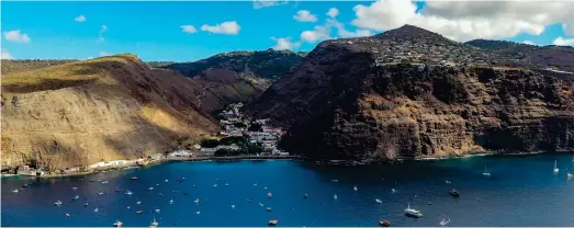  ?? ?? Splendid isolation: St Helena in the South Atlantic has a population of 4,400 and is the world’s second most remote island