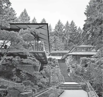  ?? GARRY BELINSKY/PORTLAND JAPANESE GARDEN VIA AP ?? This image shows the view approachin­g the Cultural Village from the Sheila Edwards-Lienhart Bridge at the Portland Japanese Garden.