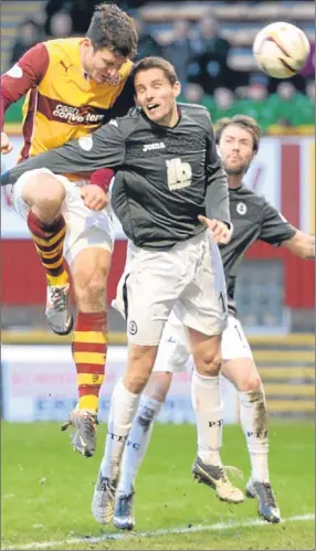  ??  ?? n Motherwell’s John Sutton rises to head in the home side’s third goal.