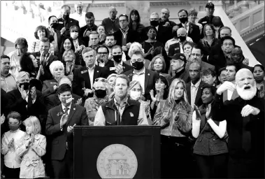  ?? BRYNN ANDERSON / ASSOCIATED PRESS ?? Georgia Gov. Brian Kemp speaks during a news conference Saturday at the State Capitol in Atlanta, about
Major League Baseball’s decision to pull the 2021 All-star Game from Atlanta over the league’s objection to a new Georgia voting law.