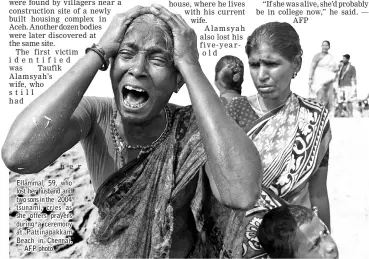  ??  ?? her Ellammal, 59, who lost her husband and two sons in the 2004 tsunami, cries as she offers prayers during a ceremony at Pattinapak­kam Beach in Chennai. — AFP photo