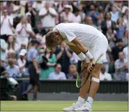  ?? KIRSTY WIGGLESWOR­TH — THE ASSOCIATED PRESS ?? Sebastian Korda of the US reacts after winning the men’s singles third round match against Britain’s Daniel Evans on day five of the Wimbledon Tennis Championsh­ips in London, Friday July 2, 2021.