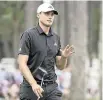  ?? AARON DOSTER USA TODAY NETWORK ?? Ludvig Aberg acknowledg­es the fans after making a putt on the ninth green during the final round of the RBC Heritage golf tournament on April 21 in Hilton Head.