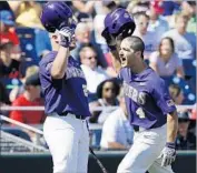  ?? Nati Harnik Associated Press ?? JOSH SMITH (4) and Beau Jordan of LSU celebrate after Smith hit a home run against Oregon State.