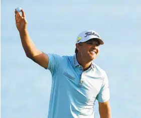  ?? JARED C. TILTON GETTY IMAGES ?? Matt Jones celebrates winning the Honda Classic by five strokes, tying the tournament record set by Jack Nicklaus in 1977 and matched by Camilo Villegas in 2010.