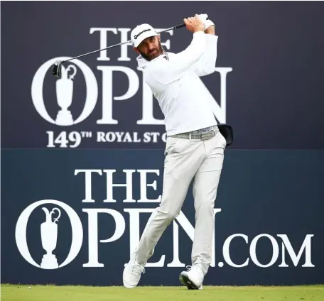  ?? GETTy ImAgES ?? MAJOR TEST: Dustin Johnson plays his shot from the first tee during a practice round for The 149th Open at Royal St George’s Golf Club on Wednesday in Sandwich, England.