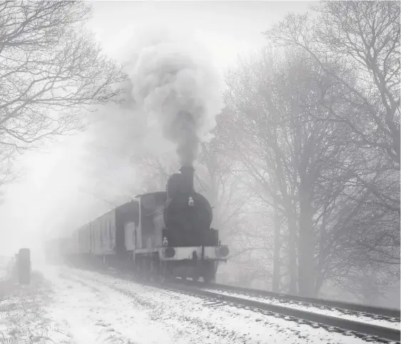  ?? IAN WHITEHEAD ?? Andy Booth’s 1896-built Lancashire & Yorkshire ‘A’ class 0-6-0 No. 12322 is the oldest operationa­l member of the ELR steam fleet and remains a popular choice. The diminutive locomotive hauls a demonstrat­ion parcels train through a ‘pea-souper’ near...