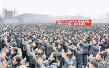  ??  ?? North Koreans celebrate the successful ICBM test-fire in South Hwanghae, North Korea. — AFP photo