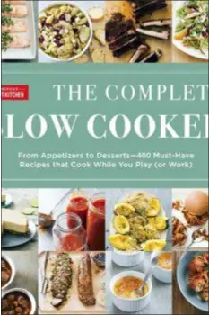  ?? AMERICA’S TEST KITCHEN VIA AP ?? This image provided by America’s Test Kitchen in February 2019 shows the cover for the cookbook “The Complete Slow Cooker.” It includes a recipe for Chicken Enchiladas.