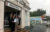  ?? SAMANTHA GEE/NELSON MAIL ?? Wakefield residents Barbara Smith, left, Alan Berwick, Delwyn Wasley, Geoff Wasley and Stuart Hore in February with the petition urging a bus service for the town.