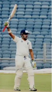  ?? — PTI ?? Delhi’s Gautam Gambhir celebrates his century in the Ranji Trophy semi- final against Bengal on Monday.