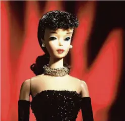  ?? ?? A “brunette with a serious side eye,” No. 1 Barbie was introduced to the world in 1959.