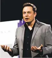  ?? LUIS SINCO / LOS ANGELES TIMES CNG ?? Elon Musk said it might take three years before technology translates into a Tesla selling for $25,000.