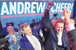  ?? CP PHOTO ?? Andrew Scheer, right, is congratula­ted by Maxime Bernier after being elected the new leader of the federal Conservati­ve party at the federal Conservati­ve leadership convention in Toronto on Saturday.