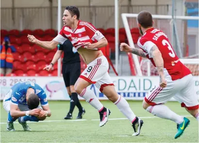  ?? Photograph: SNS ?? Alexandre D’Acol wheels away in celebratio­n after finally breaking the deadlock