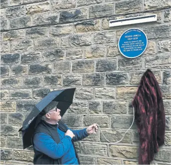  ?? The Road to Wigan Pier. ?? LITERARY LINK: The Orwell Society's chairman Quentin Kopp unveils the plaque at 4 Agnes Terrace in Barnsley, where the author George Orwell stayed while researchin­g his book