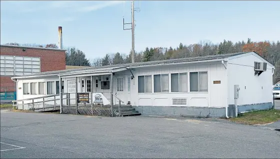  ?? SENTINEL & ENTERPRISE FILE PHOTO ?? The current Ashby Police Department headquarte­rs is in a former modular classroom.