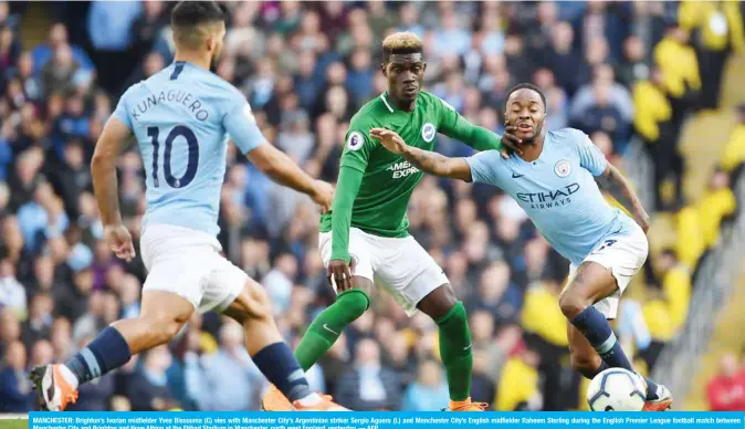  ?? — AFP ?? MANCHESTER: Brighton’s Ivorian midfielder Yves Bissouma (C) vies with Manchester City’s Argentinia­n striker Sergio Aguero (L) and Manchester City’s English midfielder Raheem Sterling during the English Premier League football match between Manchester City and Brighton and Hove Albion at the Etihad Stadium in Manchester, north west England, yesterday.
