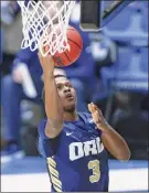  ?? Michael Hickey / Getty Images ?? Max Abmas of Oral Roberts, who leads the nation in scoring, scored 29 points to help the Golden Eagles surprise the Buckeyes.