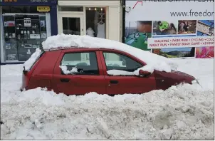  ??  ?? Hopefully we won’t have to deal with this level of snow again for another few decades.