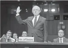  ?? MICHAEL REYNOLDS, EUROPEAN PRESSPHOTO AGENCY ?? Attorney General Jeff Sessions is sworn in before the Senate Judiciary Committee hearing on oversight of the Department of Justice on Wednesday.