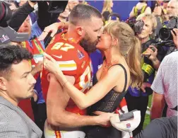  ?? ASSOCIATED PRESS ?? Taylor Swift kisses Kansas City Chiefs tight end Travis Kelce after the NFL Super Bowl 58 football game against the San Francisco 49ers, Sunday in Las Vegas. The Chiefs won 25-22.