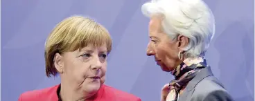  ?? AFP ?? Berlino. Christine Lagarde a Angela Merkel: crisi greca e surplus tedesco al centro dell’incontro di ieri