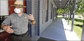  ?? AP ?? Todd Arrington, site manager for the James A. Garfield National Historic Site, talks about how Garfield would speak to the public from the front porch. Some are drawing parallels with presumptiv­e Democratic presidenti­al nominee Joe Biden, who has rarely left his home during the coronaviru­s pandemic as he struggles to get his anti-Trump message to the masses.