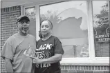  ?? [DAVID GURALNICK/ DETROIT NEWS VIA THE ASSOCIATED PRESS] ?? Eddie Hall Jr. and his wife Candace stand in front of the broken front window of their home on Thursday in Warren, Mich.