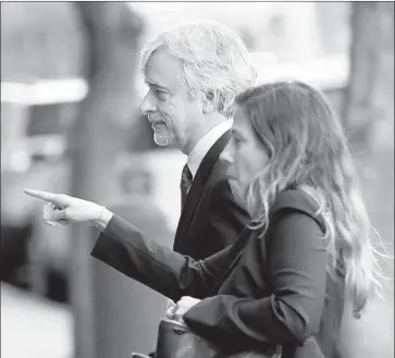  ?? Stephen Lam Getty Images ?? WAYMO Chief Executive John Krafcik arrives at U.S. District Court in San Francisco for the beginning of the trial between Waymo, the driverless car arm of Alphabet, and Uber. Krafcik was the first witness to testify.