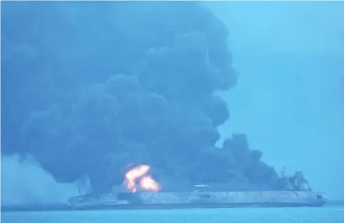  ??  ?? This handout from the Korea Coast Guard taken and released on Jan 7, shows the Panamanian-flagged tanker ‘Sanchi’ on fire after a collision with a cargo ship at sea. — AFP photo