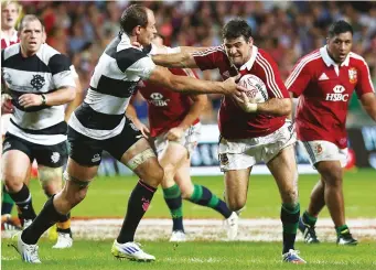  ?? PICTURE: Getty Images ?? No contest: Lions sweep to victory against the Barbarians in 2013