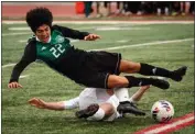  ?? PHOTO BY SCOTT VARLEY ?? Poly's Roberto Bermudez is upended on a slide tackle by San Clemente's Jacob Poole during Saturday's game.