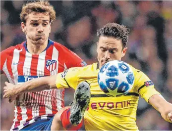  ?? FOTO: DPA ?? Antonie Griezmann war wieder erfolgreic­h, Dortmunds Thomas Delaney (re.) hat das Nachsehen.