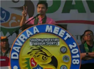  ?? PNA Photo ?? Manny Pacquiao encourages young athletes at the DAVRAA Meet 2018 held in Davao City.