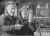  ??  ?? WIFE Patti Scialfa lends vocals as a member of the band. The documentar­y is in black and white.