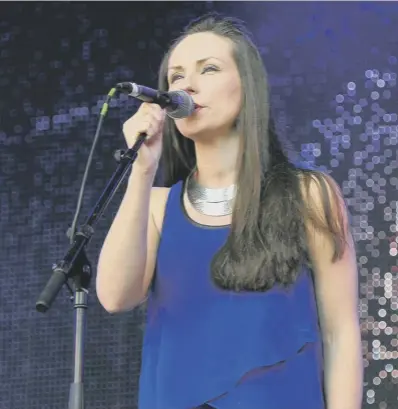  ??  ?? 0 Julie Fowlis, superstar Gaelic singer, admits to an ‘obsession’ with the sea; Angus Mackenzie, below, piper with Highland band Dàimh, has lived on an island all his life