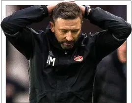  ??  ?? CHANCE GONE: McInnes rues Stockley’s miss before Rangers’ opener