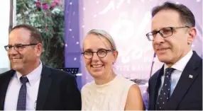  ??  ?? FRENCH AMBASSADOR Hélène Le Gal, flanked by Communicat­ions Minister Ayoub Kara (left) and cabinet secretary Tzachi Braverman.