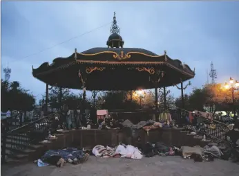  ?? AP PHOTO/DARIO LOPEZ-MILLS ?? Migrants sleep under a gazebo at a park on March 27 in Reynosa, Mexico.